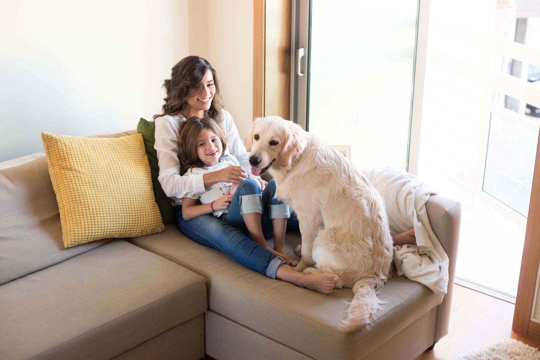 dog-with-human-family-at-home-33MDTJW red